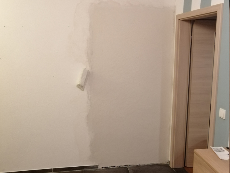 Verspachteln und nahtlose Anpassung an Bestandsputz